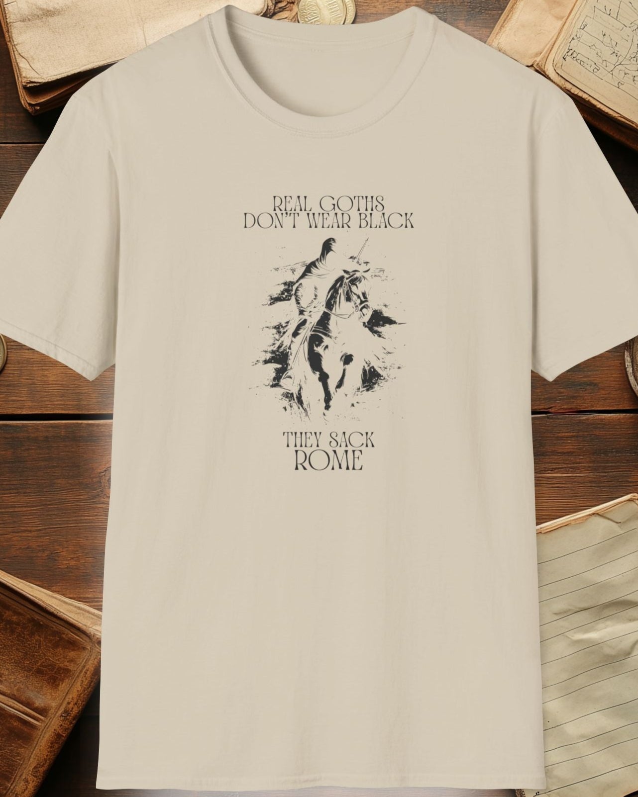 sand tshirt with a warrior and the text "real goths dont wear black, they sack rome"