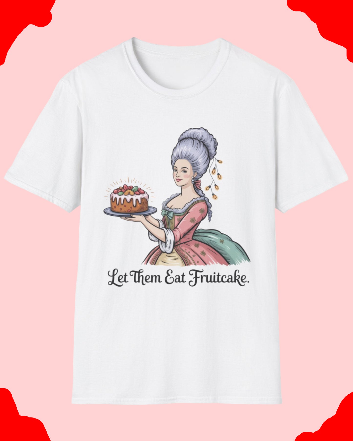 White t-shirt with a graphic of a woman holding a fruitcake and text 'Let Them Eat Fruitcake' on a white background.