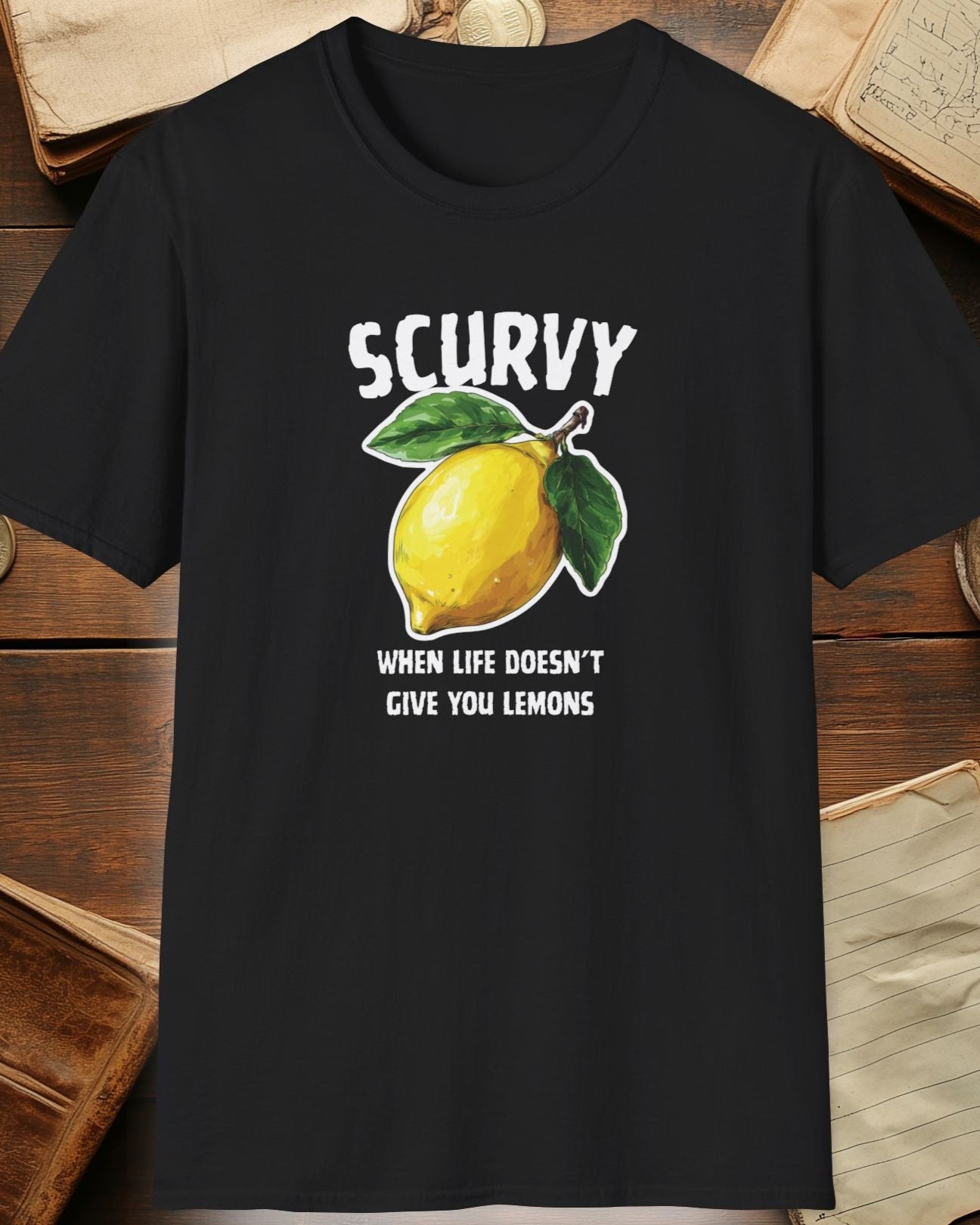 black tshirt with a lemon and the text "scurvy, when life doesnt give you lemons"