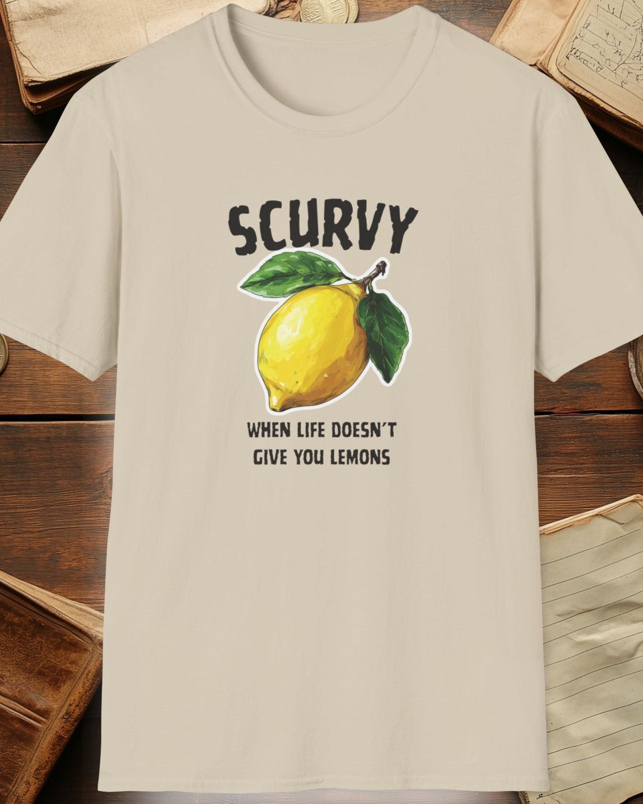 sand tshirt with a lemon and the text "scurvy, when life doesnt give you lemons"