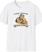 A white short-sleeve crewneck t-shirt featuring with the text 'I THINK, THEREFORE I NEED A NAP' printed on the chest.