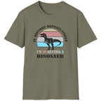Heather green T-Shirt with the text "If history repeats itself I am so getting a Dinosaur". There is also a image of a dinosaur on a colourful background.  