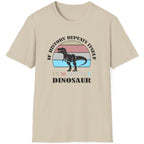 Sand coloured T-Shirt with the text "If history repeats itself I am so getting a Dinosaur". There is also a image of a dinosaur on a colourful background.  