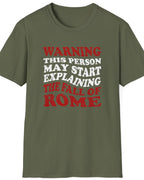 Green T-Shirt with the text "Warning! This person may start explaining the fall of rome" in white and red. 