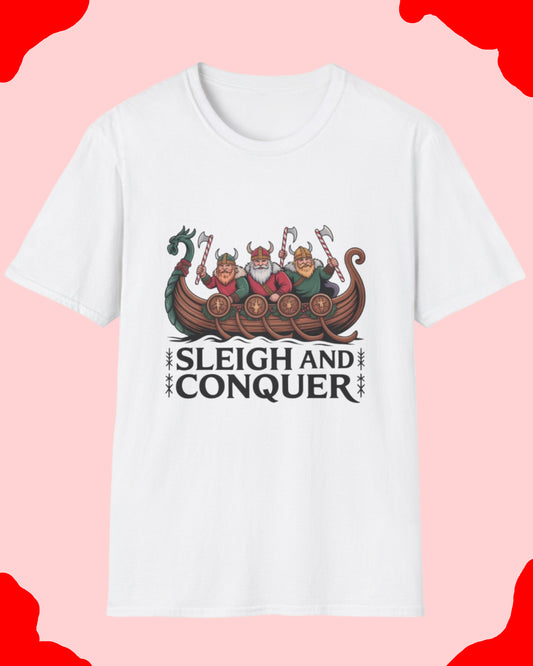 White t-shirt with a graphic of three men in a boat and the text 'Sleigh and Conquer' on a white background.