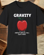 black tshirt with a apple and the text "Gravity, Making apples fall since 1665"