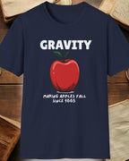 navy tshirt with a apple and the text "Gravity, Making apples fall since 1665"