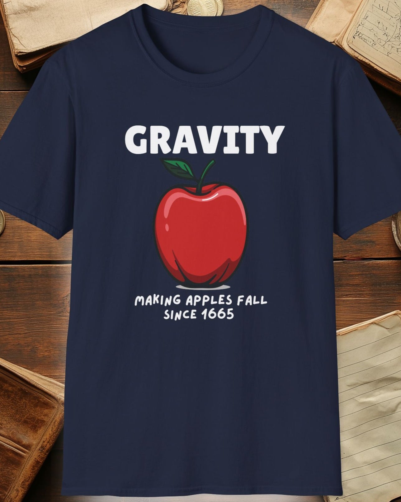 navy tshirt with a apple and the text "Gravity, Making apples fall since 1665"