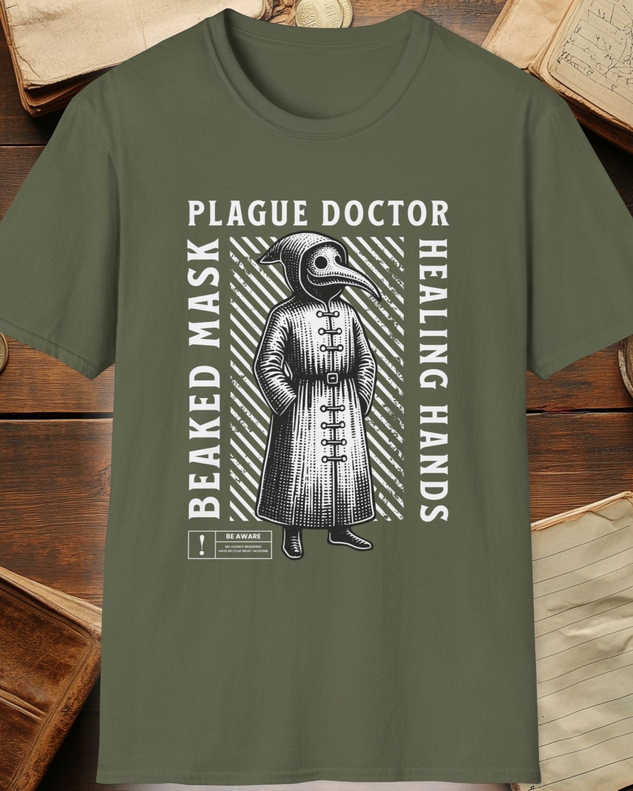 Green shirt with the plague doctor and the text "beaked mask,plague doctor, healing hands"