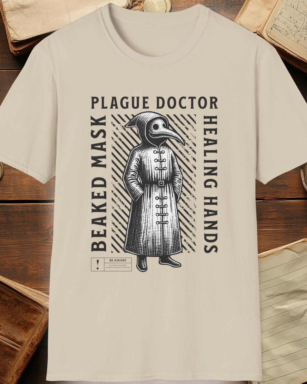 sand shirt with the plague doctor and the text "beaked mask,plague doctor, healing hands"